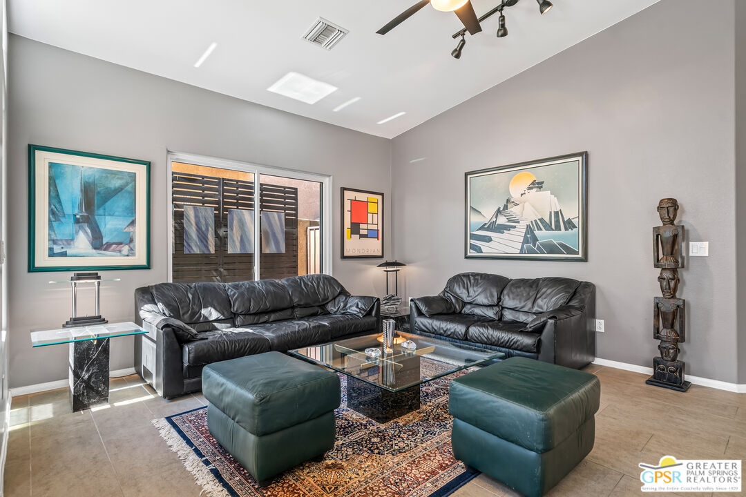 67860 Ontina Road Cathedral City, CA 92234 - Photo 4 of 48 a living room with furniture and a window