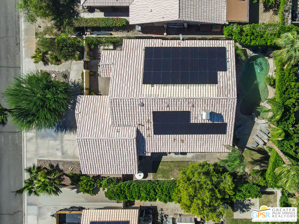 67860 Ontina Road Cathedral City, CA 92234 - Photo 46 of 48 a front view of a house with a garage