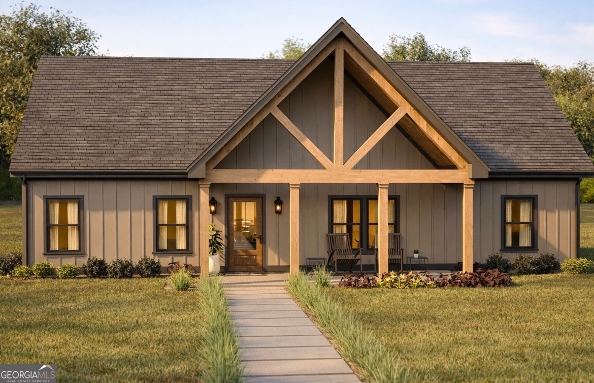 605 Berlin Road Homer, GA 30547 - Photo 1 of 1 a front view of a house with a yard