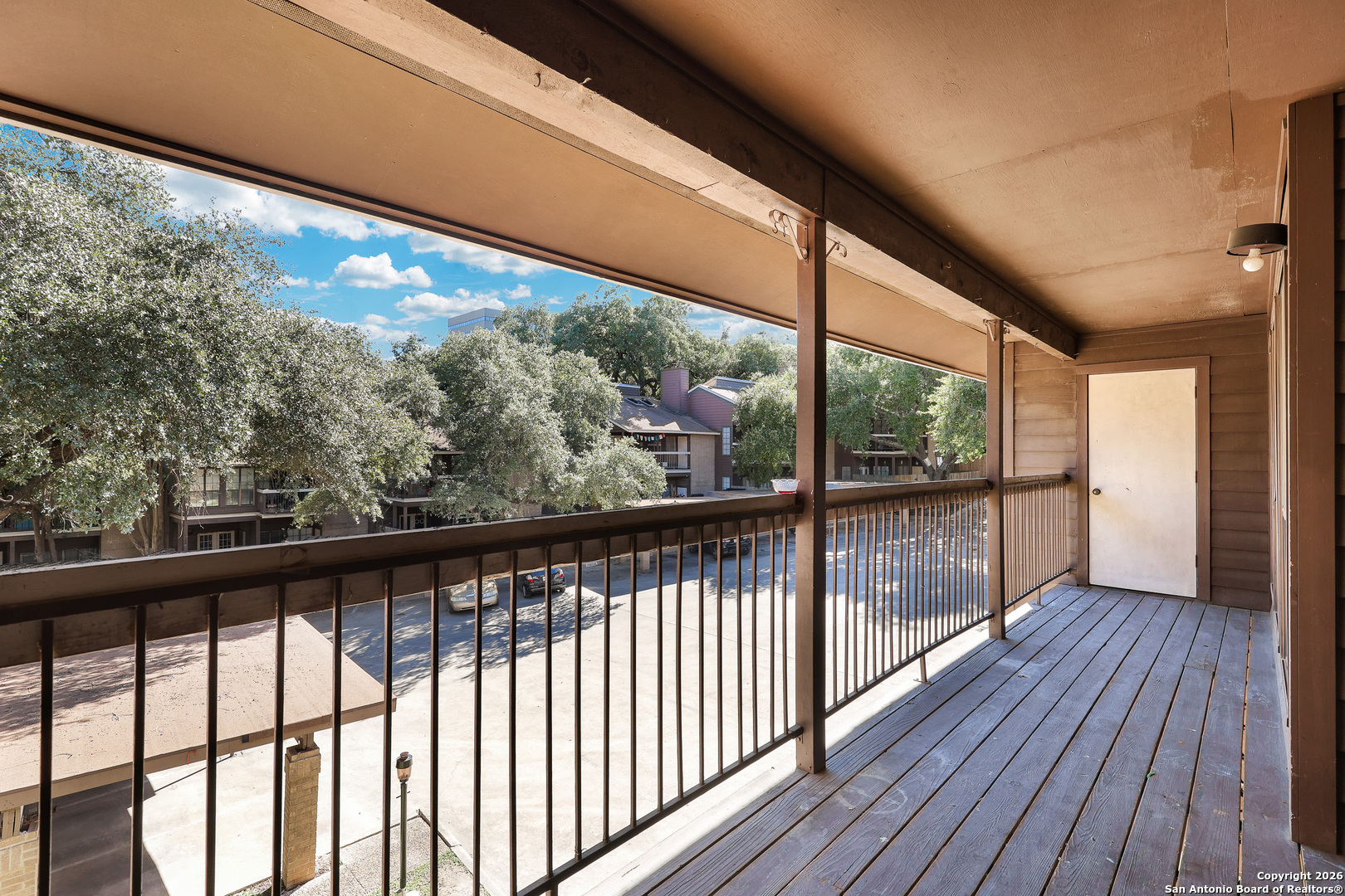 8633 Datapoint Drive, Unit 224 San Antonio, TX 78229 - Photo 25 of 27 a view of a city from a balcony