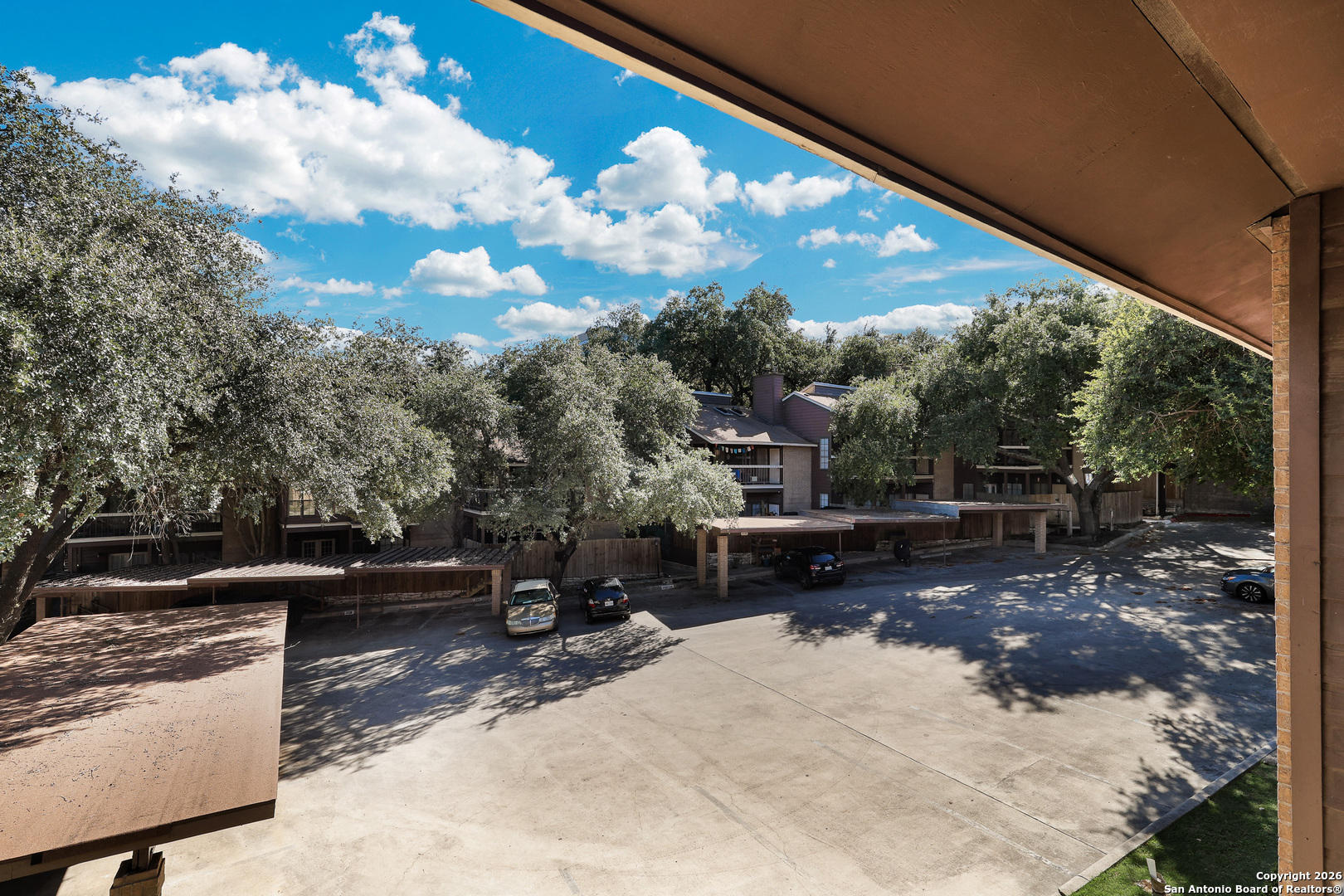 8633 Datapoint Drive, Unit 224 San Antonio, TX 78229 - Photo 26 of 27 a view of outdoor space with seating