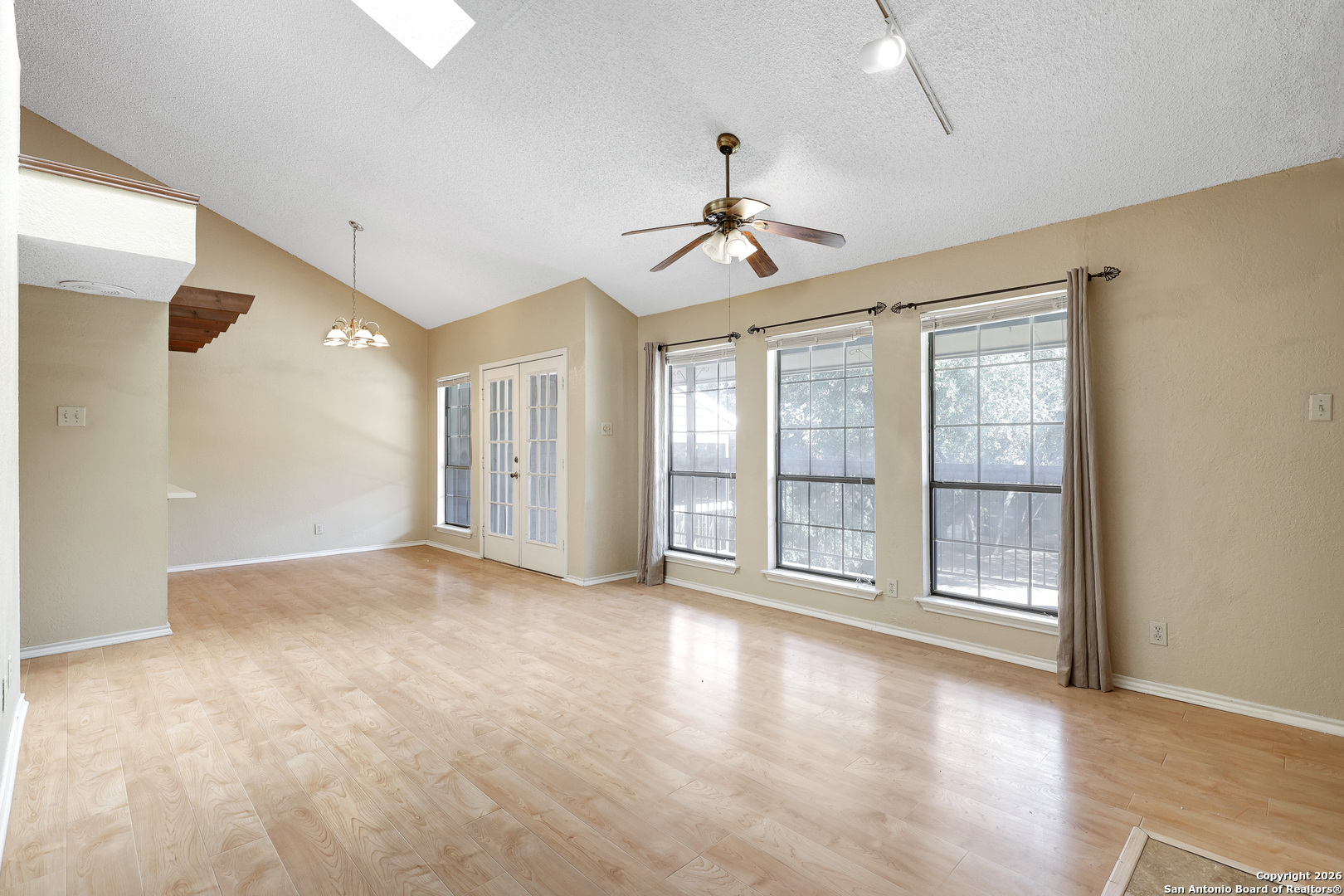 8633 Datapoint Drive, Unit 224 San Antonio, TX 78229 - Photo 5 of 27 a view of an empty room with a window