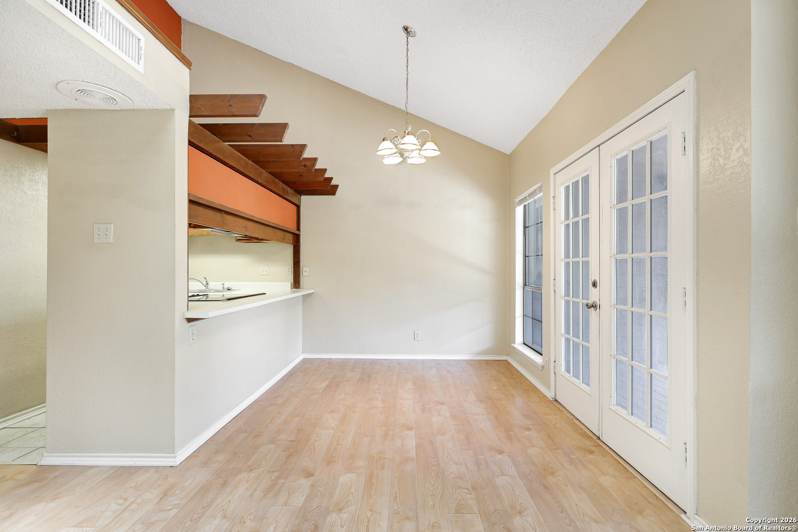 8633 Datapoint Drive, Unit 224 San Antonio, TX 78229 - Photo 8 of 27 a view of an entryway with wooden floor