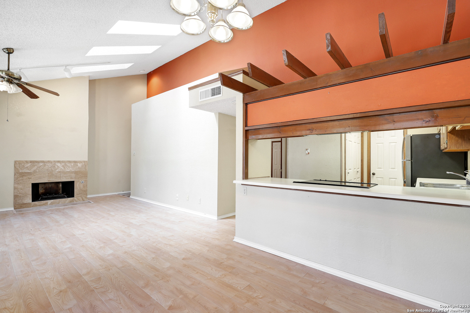 8633 Datapoint Drive, Unit 224 San Antonio, TX 78229 - Photo 10 of 27 a view of a livingroom with a fireplace