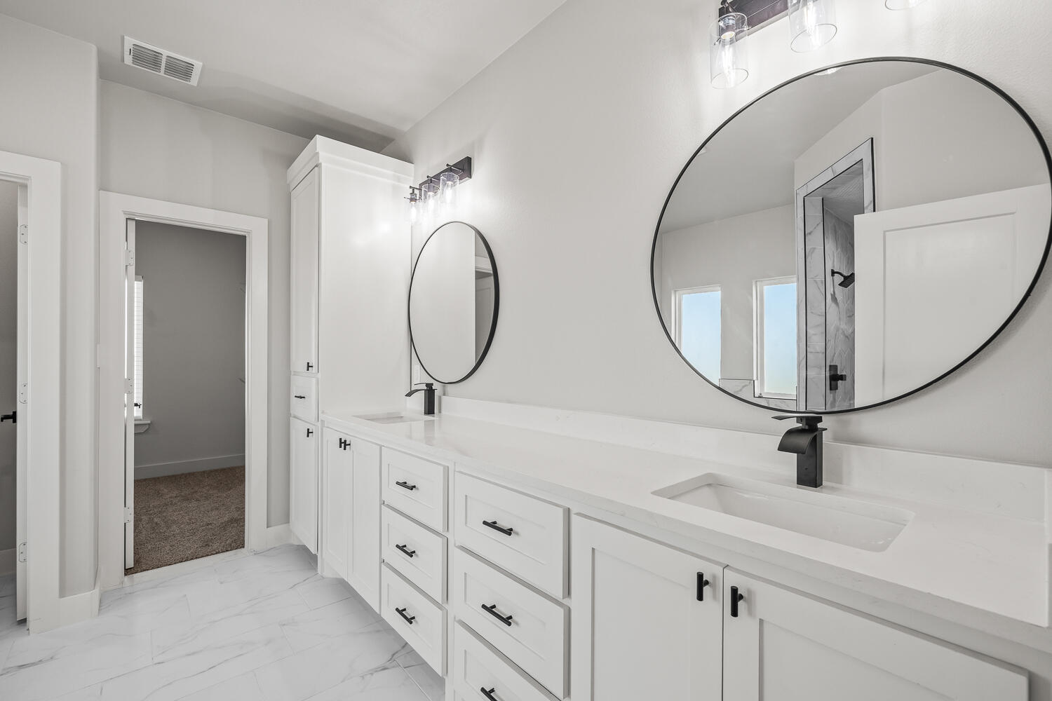 17414 C R 3100 Slaton, TX 79364 - Photo 19 of 46 a bathroom with a sink a mirror a vanity and a shower