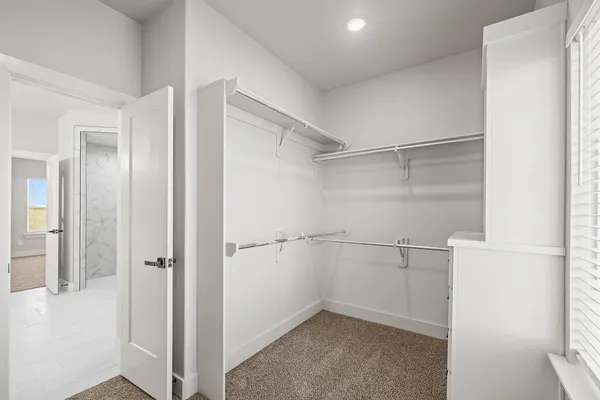 a view of a kitchen with a sink dishwasher a refrigerator and a stove