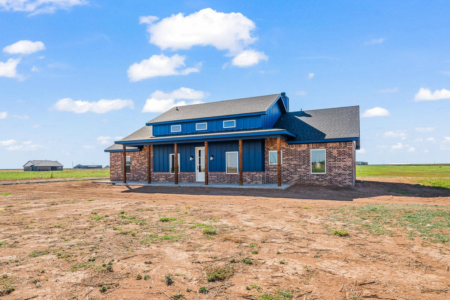 17414 C R 3100 Slaton, TX 79364 - Photo 3 of 46 a view of a house with a yard and sitting area