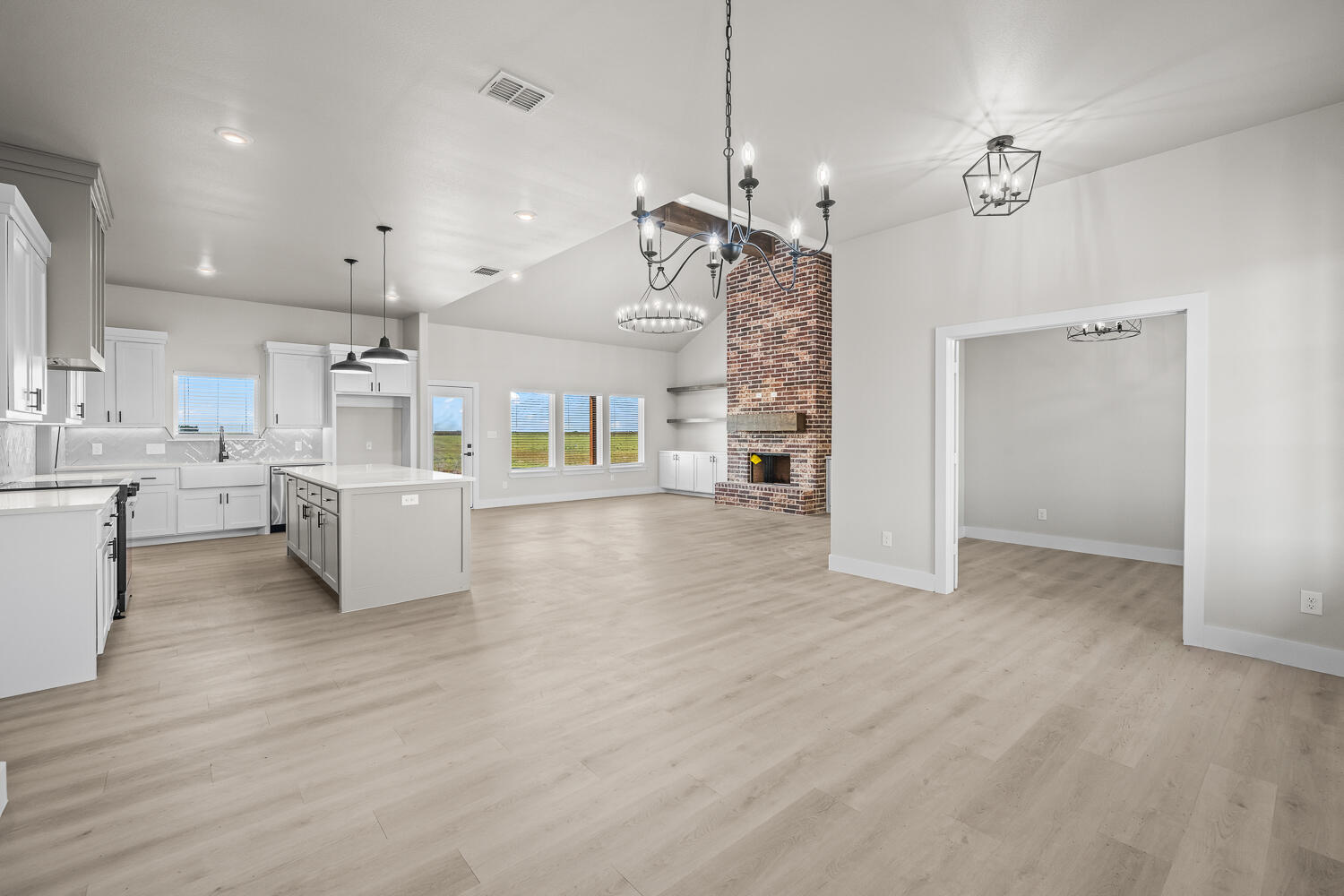 17414 C R 3100 Slaton, TX 79364 - Photo 34 of 46 a view of a kitchen with furniture and wooden floor
