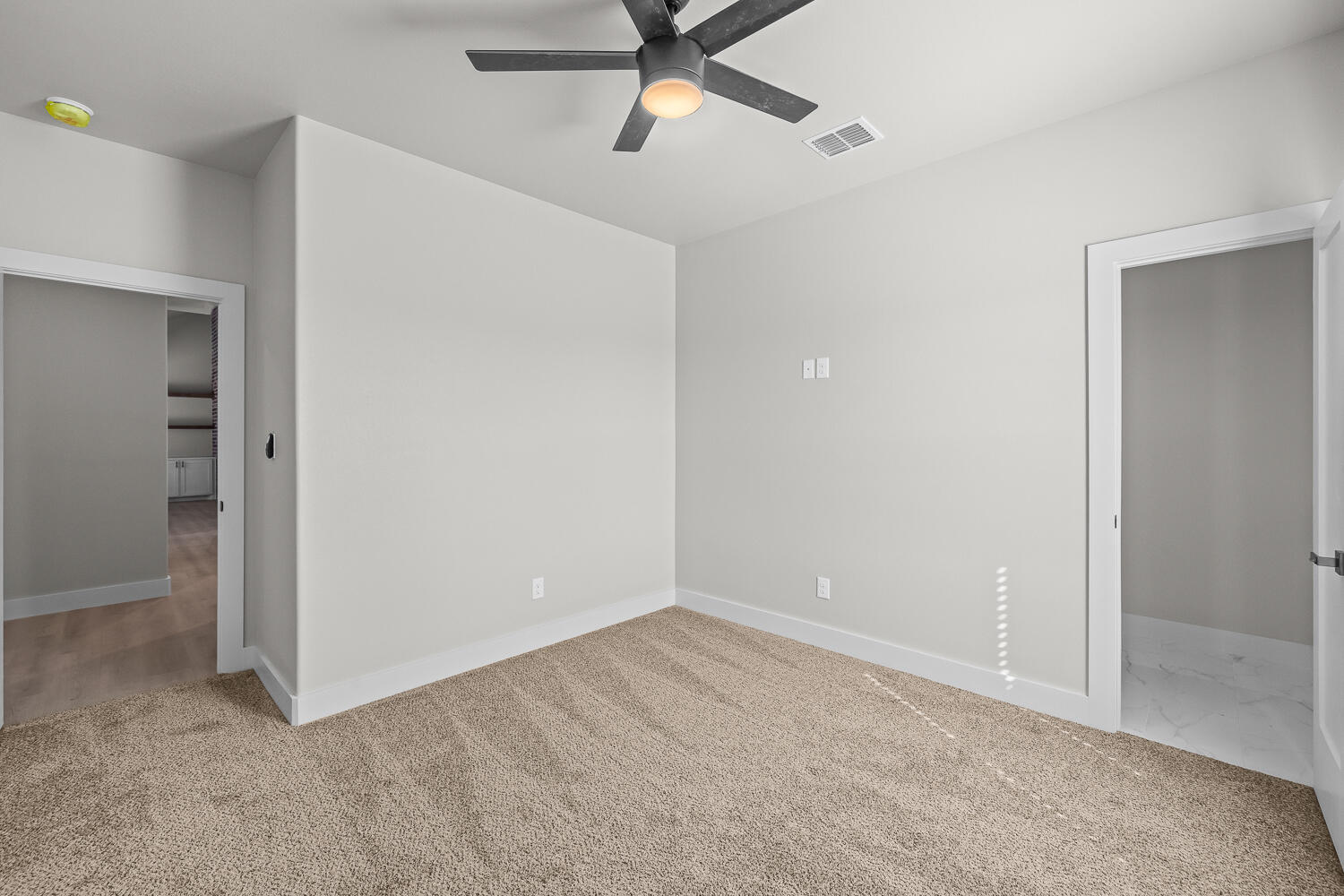 17414 C R 3100 Slaton, TX 79364 - Photo 8 of 46 an empty room with closet and windows