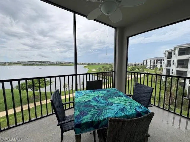 a view of a chair and table in the balcony