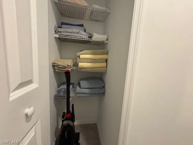 a view of a swimming pool with a yard