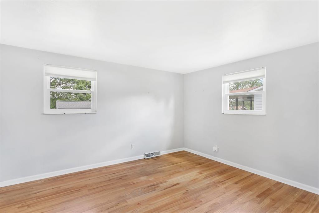 604 Dressel Road Allison Park, PA 15101 - Photo 12 of 25 The master bedroom is situated in the rear of the house. It features exposed hard wood floors, 2 windows with blinds, a closet with organizers an en-suite 2-piece half bathroom.