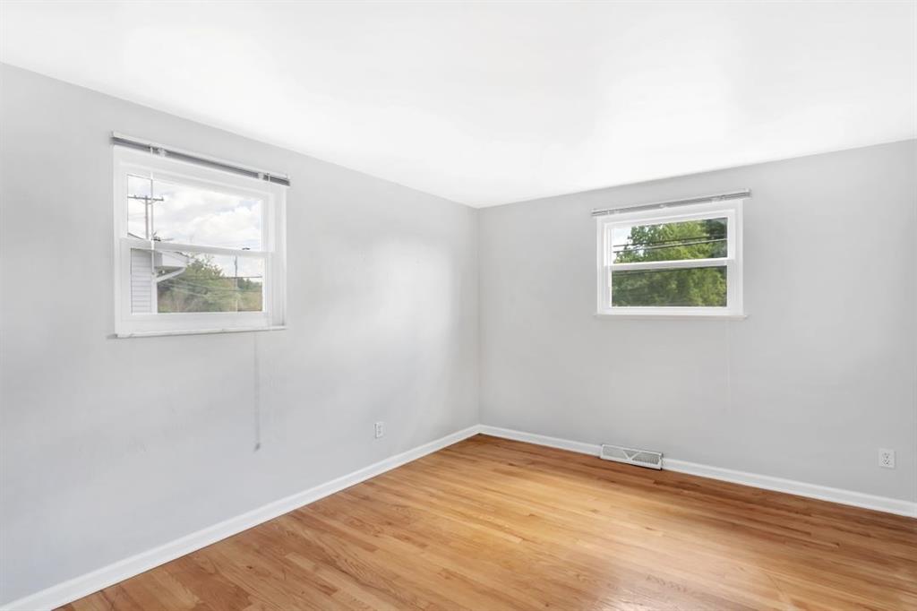604 Dressel Road Allison Park, PA 15101 - Photo 15 of 25 The 2nd bedroom is situated in the front of the house. It features exposed hard wood floors, 2 windows with blinds and a closet with organizers.