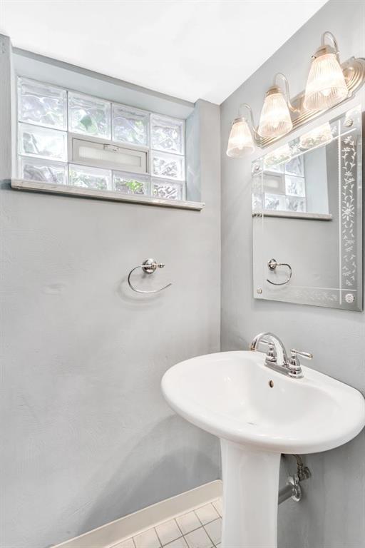 604 Dressel Road Allison Park, PA 15101 - Photo 19 of 25 The lower level 2-piece half bath features a sink & toilet.