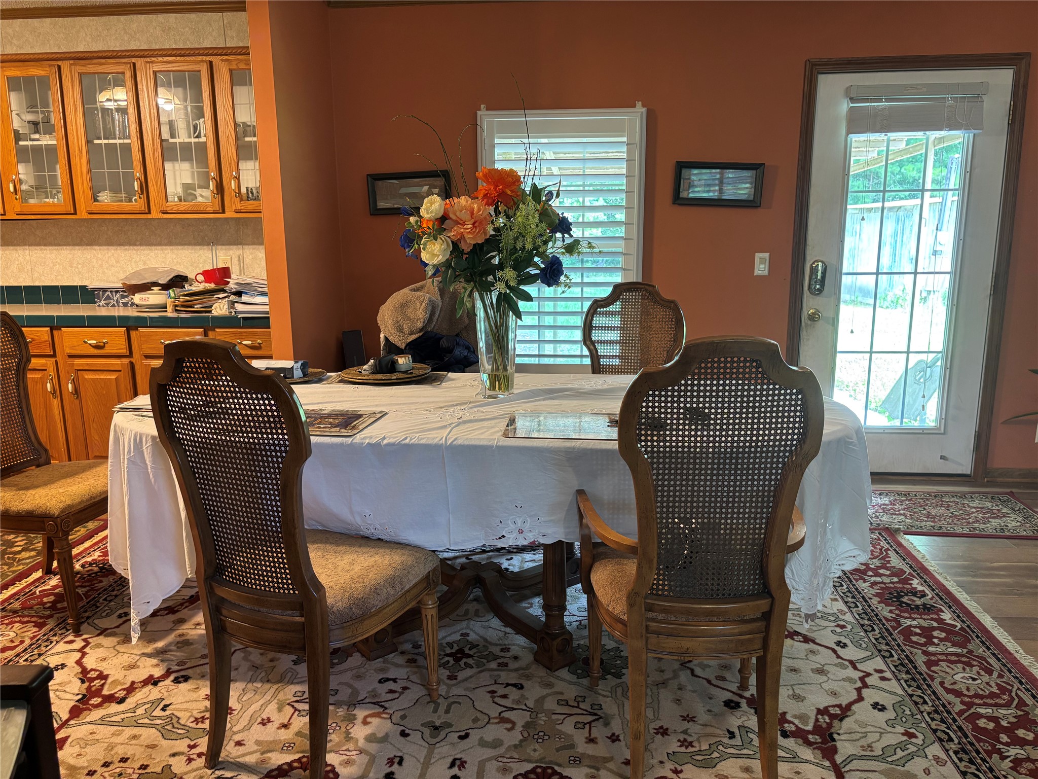 35599 State Highway South Buna, TX 77612 - Photo 17 of 40 a dining room with furniture potted plants and wooden floor