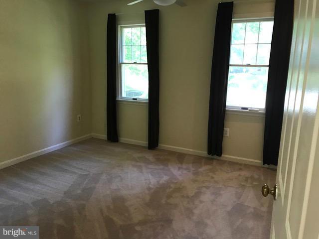 9 Redgate Court Silver Spring, MD 20905 - Photo 14 of 29 an empty room with windows