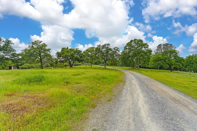 a view of a field with clear sky