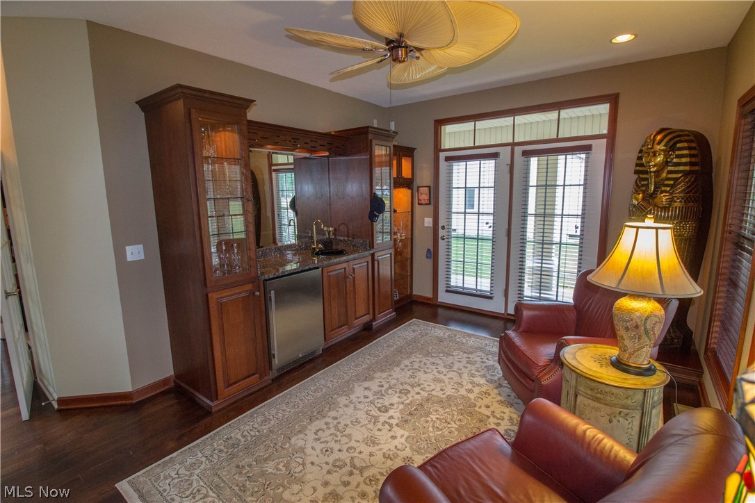 4368 Hamilton Road Medina, OH 44256 - Photo 8 of 35 Intimate retreat with cherry cabinetry, wet bar, new refrigerator and porch entry.