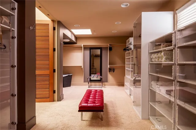 a view of an empty room with glass door