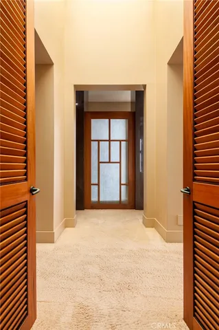 a room with furniture and a large window