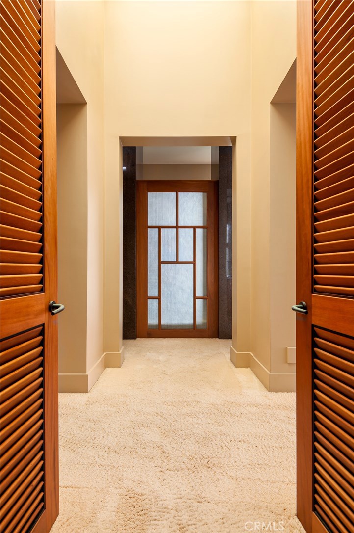 35121 Beach Road Dana Point, CA 92624 - Photo 22 of 46 a view of an empty room with glass door