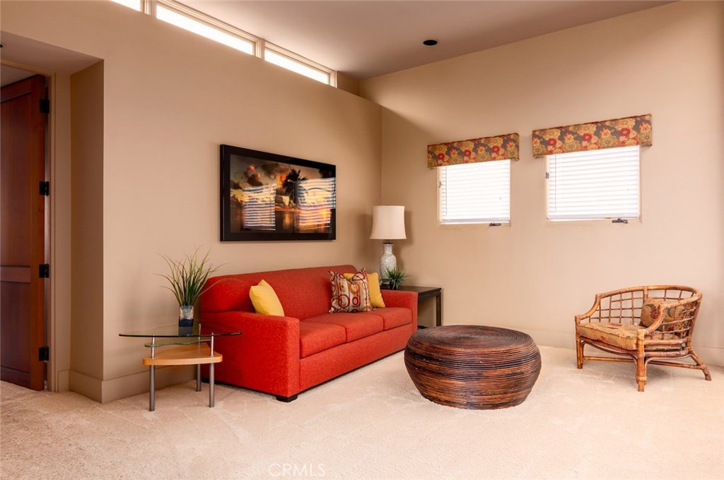 35121 Beach Road Dana Point, CA 92624 - Photo 27 of 46 a living room with furniture and a chair