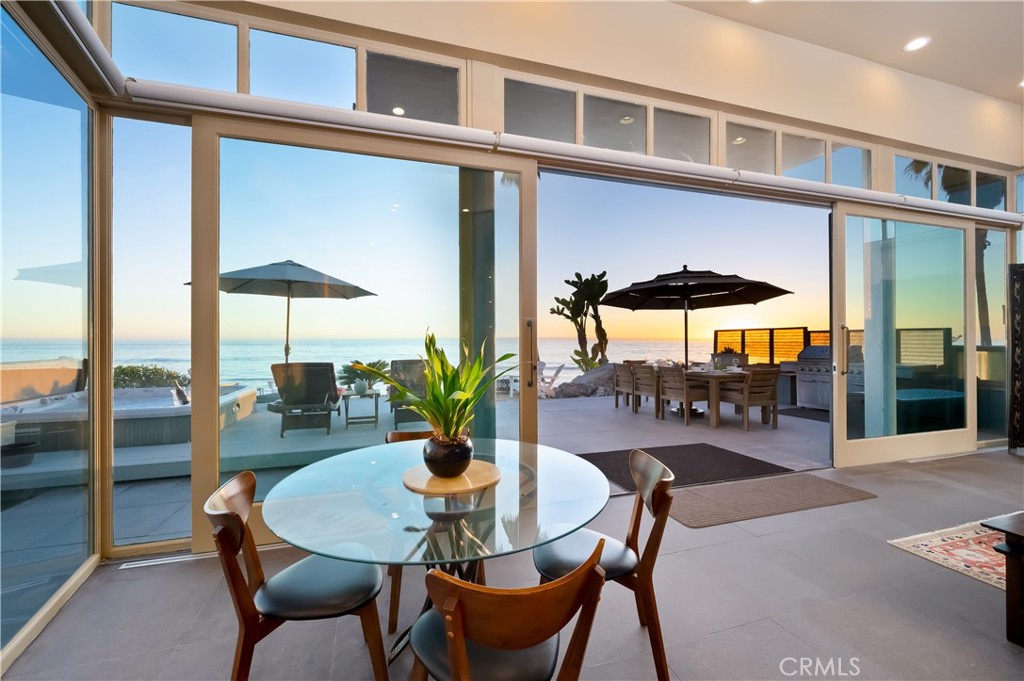 35121 Beach Road Dana Point, CA 92624 - Photo 3 of 46 a outdoor space with a table and chairs