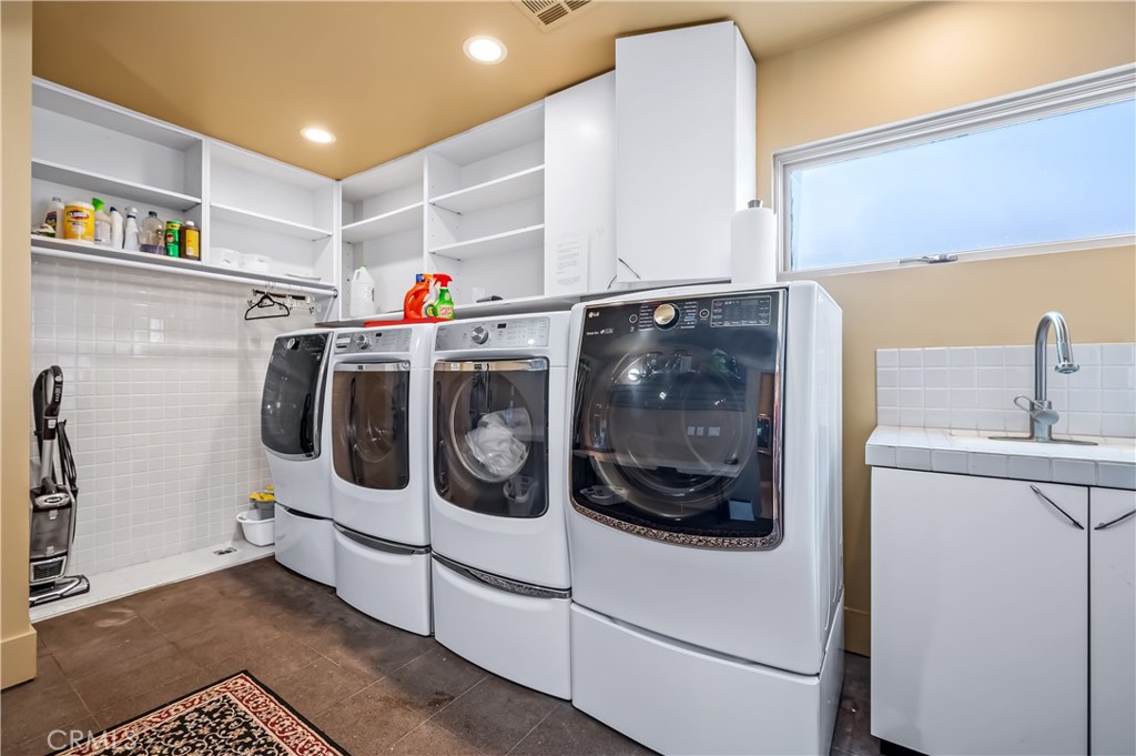 35121 Beach Road Dana Point, CA 92624 - Photo 36 of 46 a utility room with dryer and washer