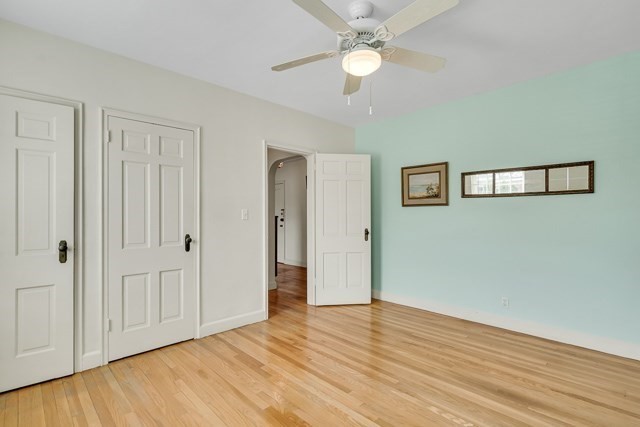 46 Browne Street, Unit 1 Brookline, MA 02446 - Photo 12 of 15 a view of an empty room with wooden floor