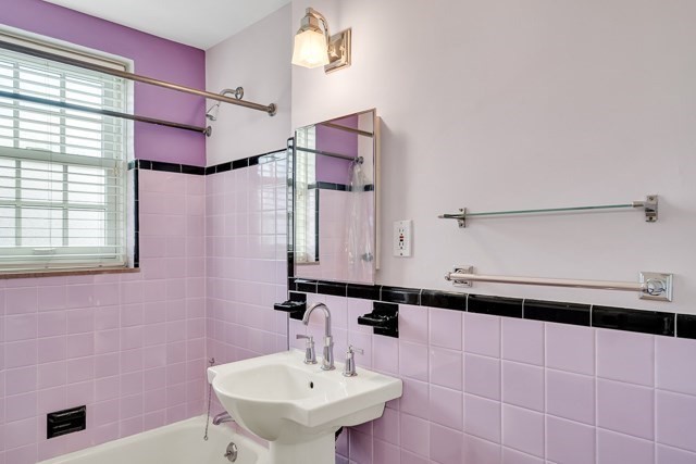 46 Browne Street, Unit 1 Brookline, MA 02446 - Photo 13 of 15 a bathroom with a sink and a mirror