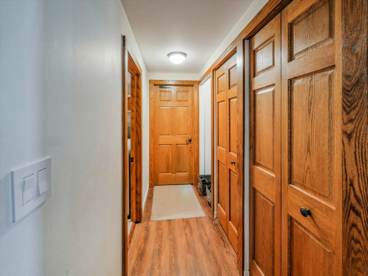 333 Rugby Place Schaumburg, IL 60169 - Photo 27 of 34 a view of a hallway with wooden floor and staircase