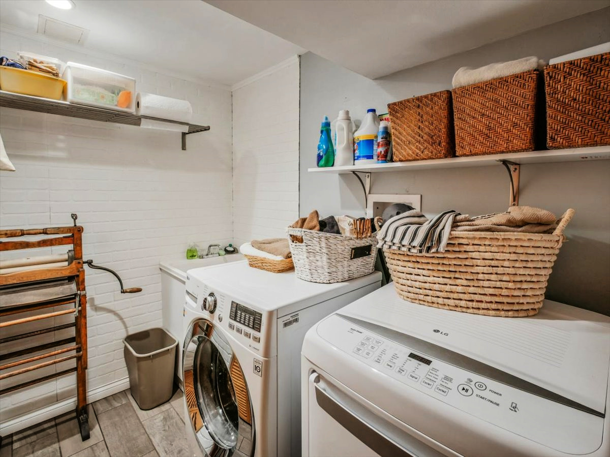 333 Rugby Place Schaumburg, IL 60169 - Photo 30 of 34 a view of storage and utility room with washer and dryer