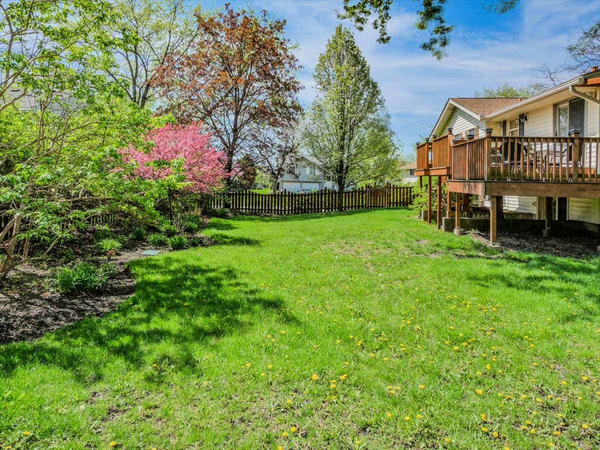 333 Rugby Place Schaumburg, IL 60169 - Photo 32 of 34 a view of a house with a yard