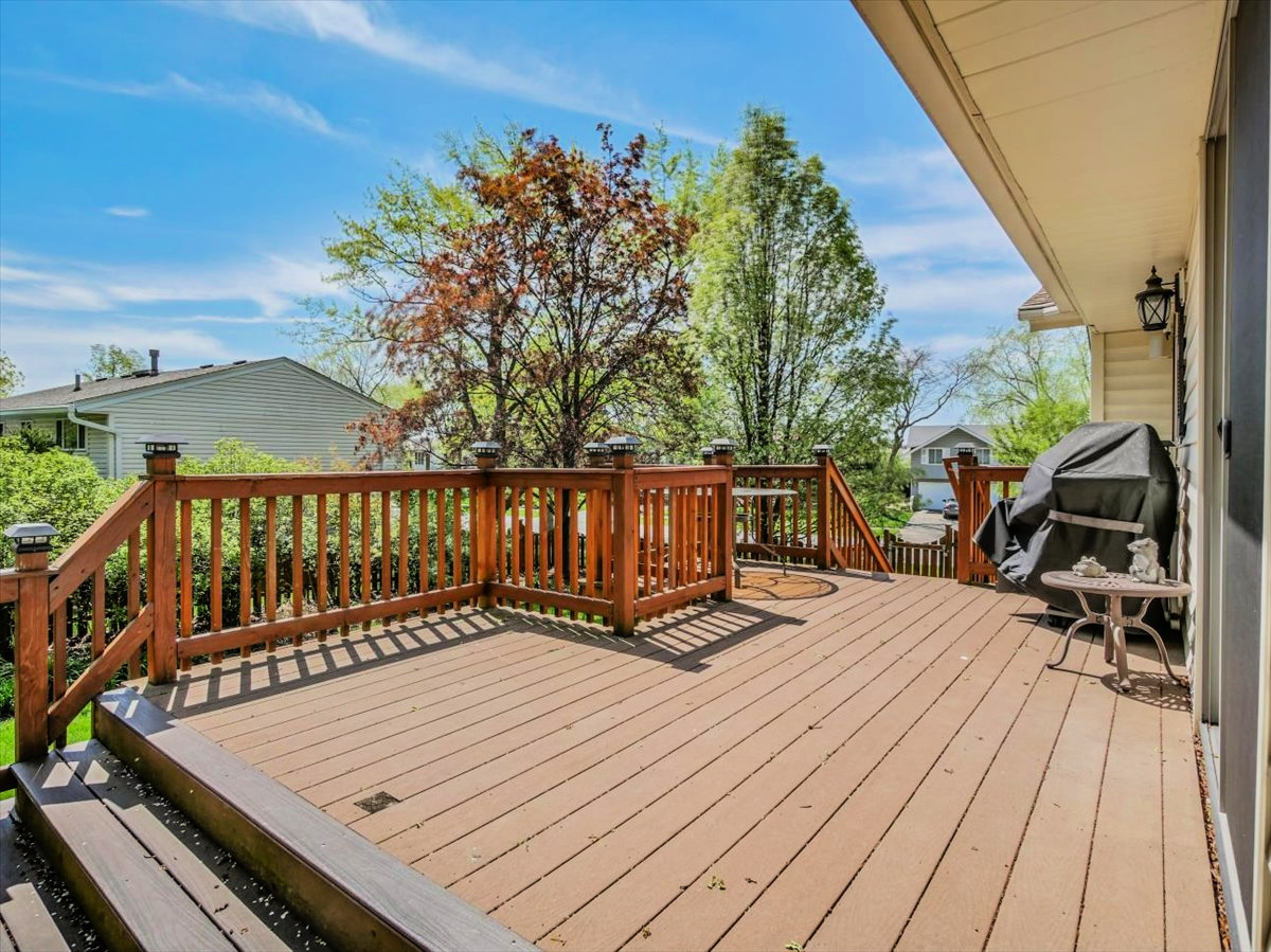 333 Rugby Place Schaumburg, IL 60169 - Photo 34 of 34 a view of wooden deck with a patio