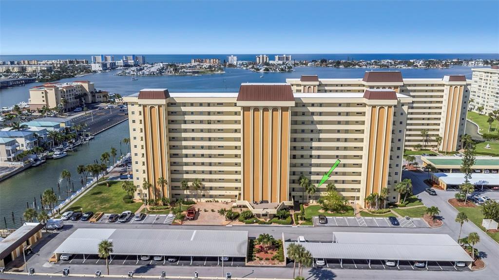 4550 Cove Circle, Unit 207 St. Petersburg, FL 33708 - Photo 1 of 1 a view of a city with tall buildings