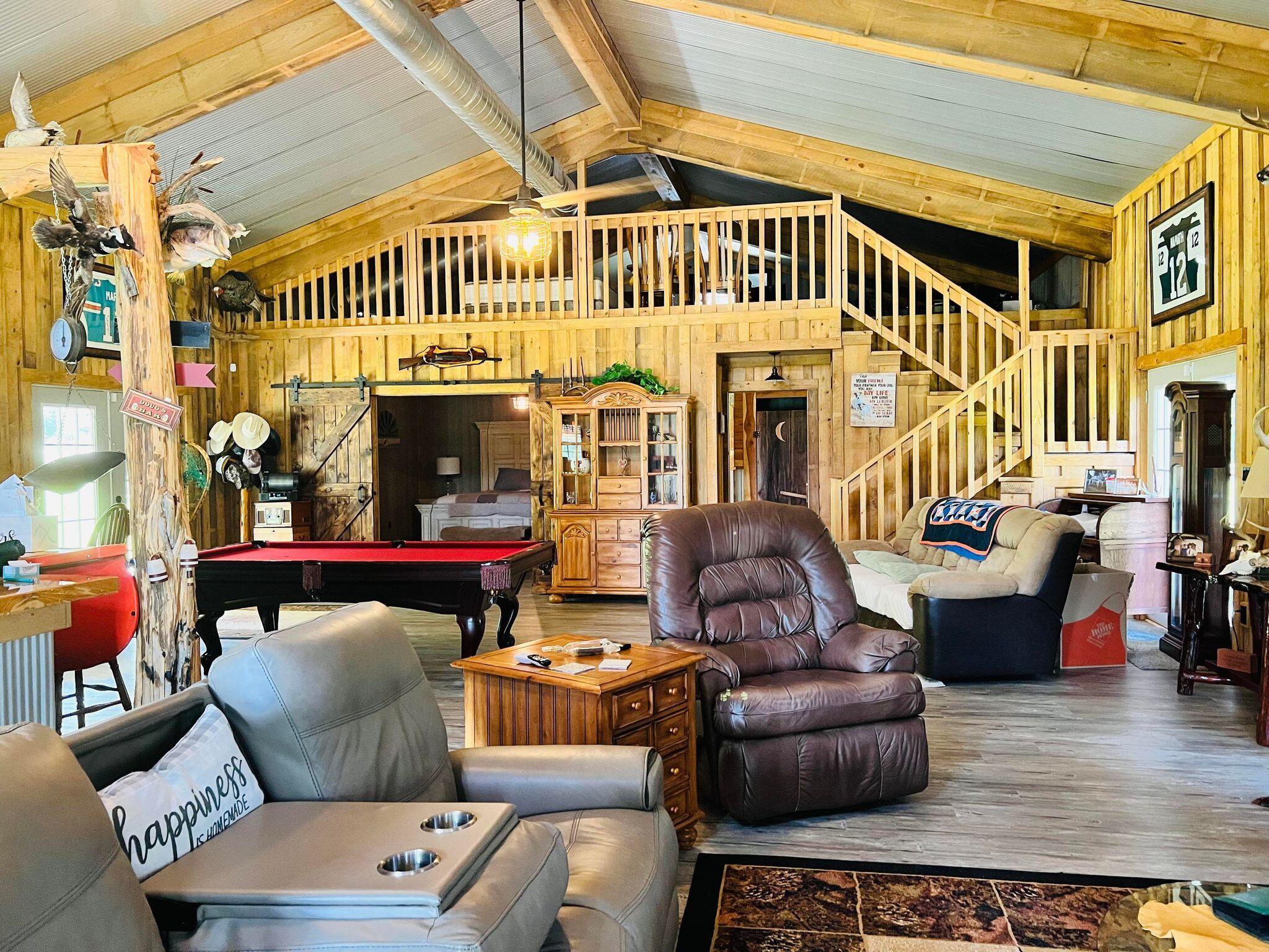 6389 Yellow River Ranch Road Florala, AL 36442 - Photo 4 of 30 a living room with furniture and a ceiling fan