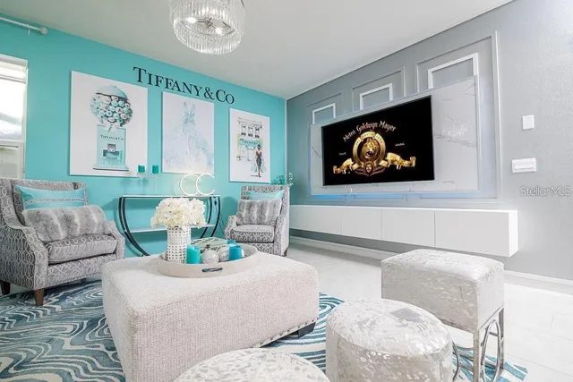 a view of a livingroom with furniture and window