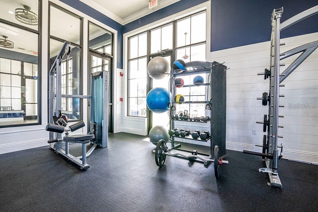 2937 Hooded Crane Cove Harmony, FL 34773 - Photo 55 of 58 a view of a room with gym equipment
