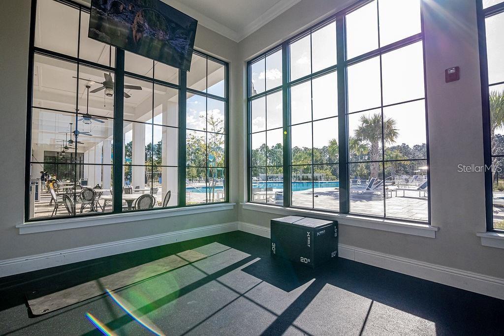 2937 Hooded Crane Cove Harmony, FL 34773 - Photo 58 of 58 a room with a large window