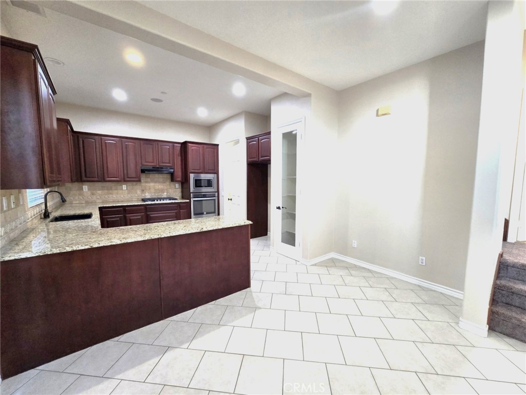 4512 Luigl Court Riverside, CA 92501 - Photo 3 of 15 Kitchen