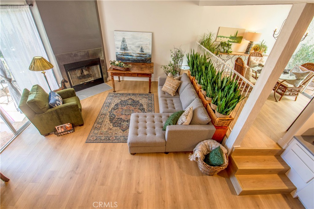 a living room with furniture and a table
