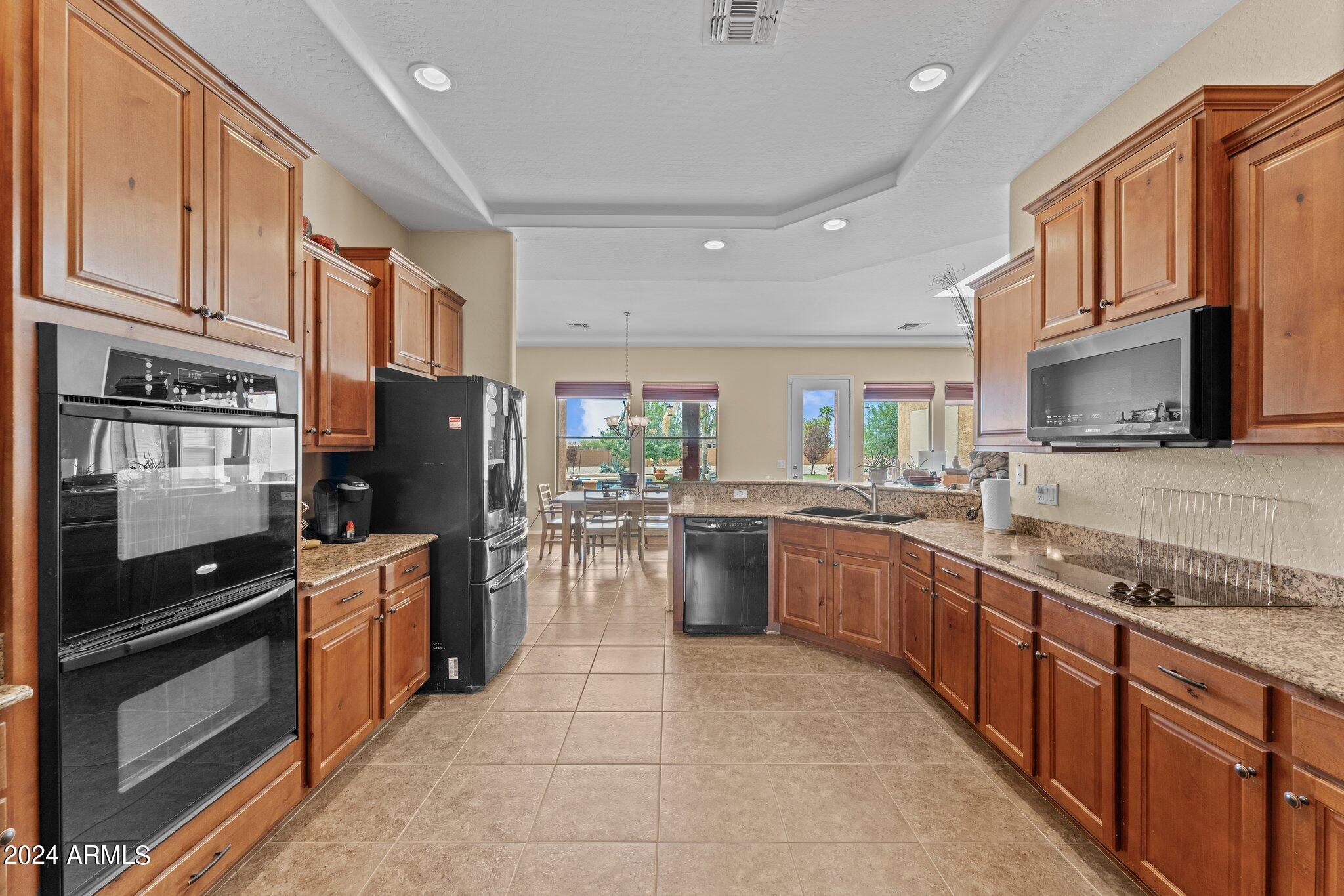 23035 West Sierra Ridge Way Wittmann, AZ 85361 - Photo 8 of 38 26-web-or-mls-DSC07939