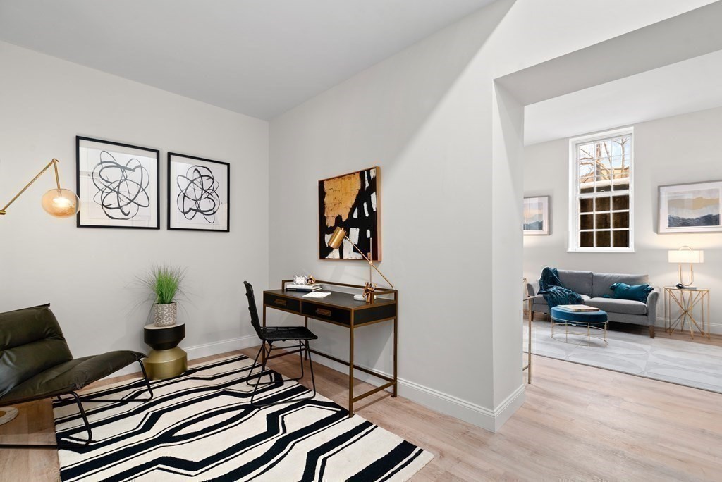 65 Glen Road, Unit H2 Brookline, MA 02445 - Photo 15 of 34 a living room with furniture and wooden floor