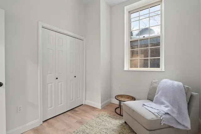 a room with furniture and a window