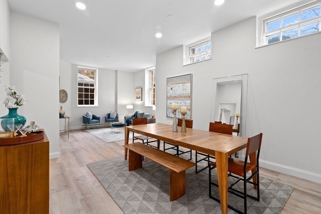 65 Glen Road, Unit H2 Brookline, MA 02445 - Photo 5 of 34 a room with dining table and chairs