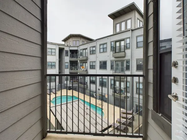 a view of a building from a balcony