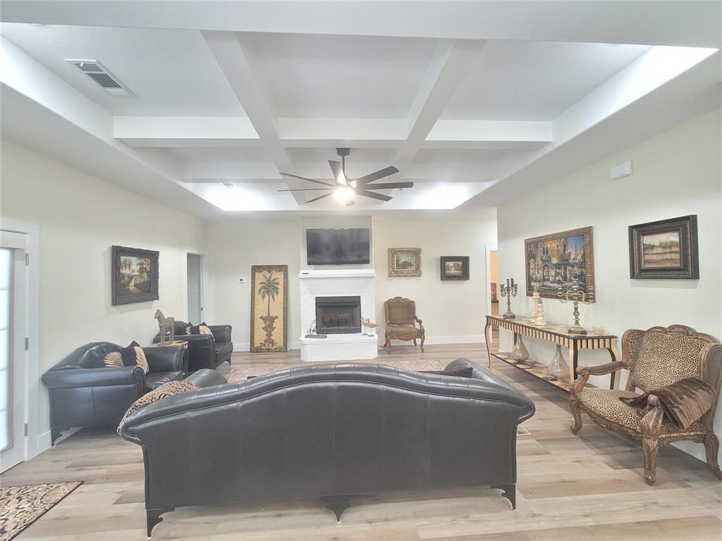 4825 Wichita Street Granbury, TX 76048 - Photo 15 of 30 a living room with furniture and flat screen tv