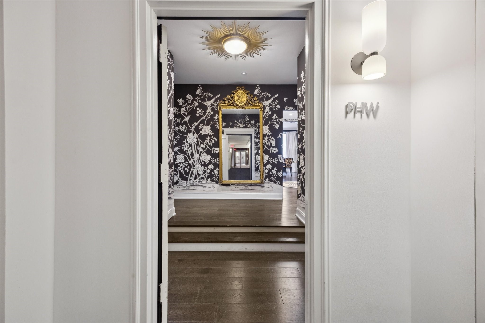 2701 Westheimer Road, Unit PHW Houston, TX 77098 - Photo 1 of 40 REGENCY HOUSE WPH is a fully renovated 2,570 SF penthouse-style residence at 2701 Westheimer featuring 2 bedrooms, 2.5 baths, plus a versatile media/library/dining room and a den with laundry/closet—elevated by designer finishes and extensive smart-home prewiring.