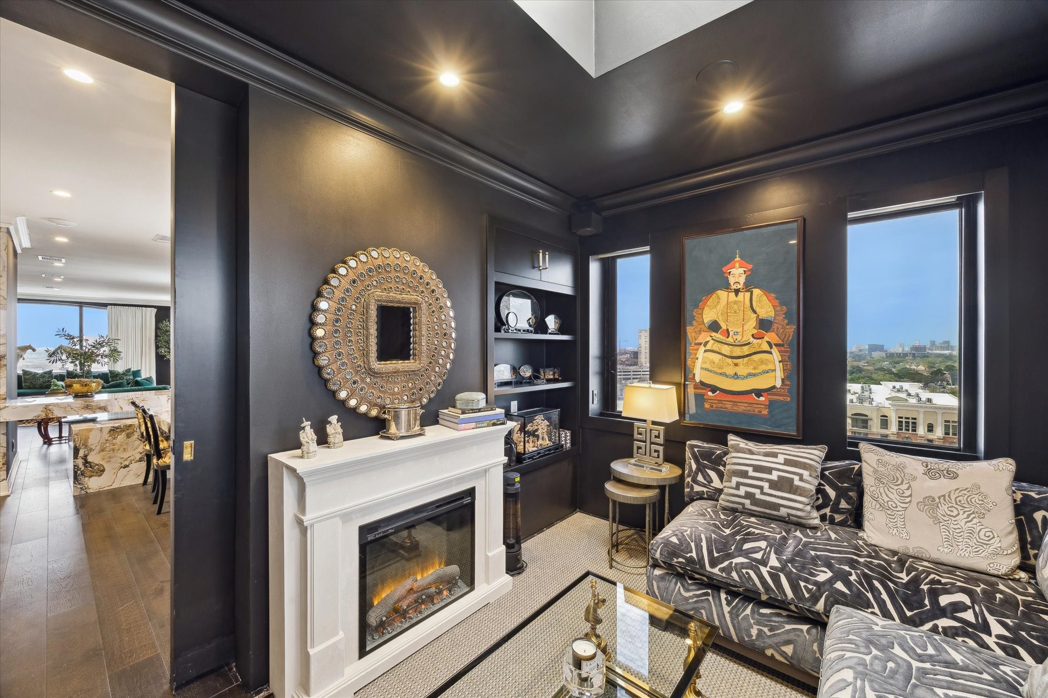 2701 Westheimer Road, Unit PHW Houston, TX 77098 - Photo 12 of 40 Versatile Flex Rooms – Includes a Den with a mock fireplace and retractable bookshelves, plus a Media/Library/Dining room.