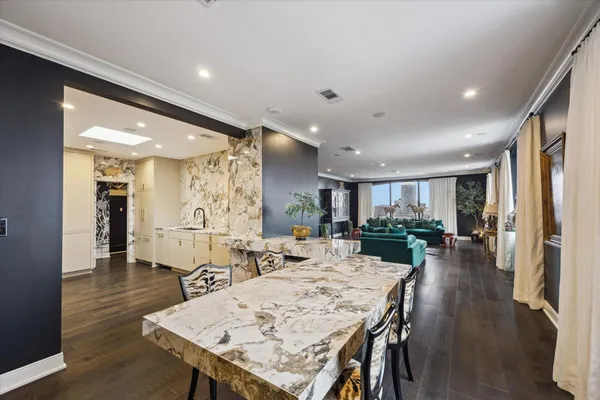 a view of a dining room with furniture